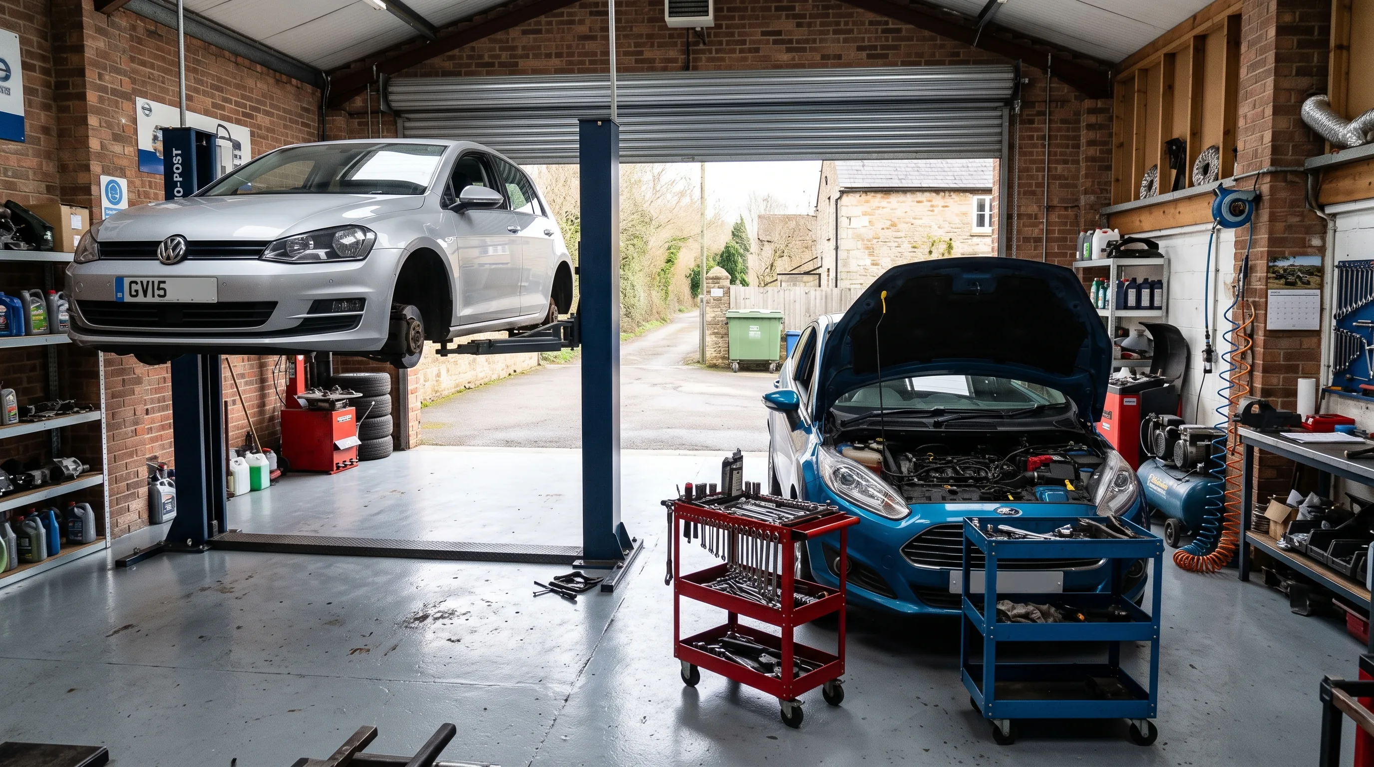 A car up on the ramp in the workshop